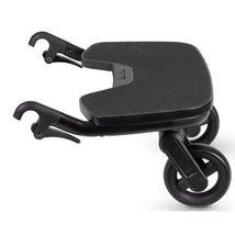 Ride-on board for the Silver Cross Dune/Reef, featuring a black platform and wheels for added convenience.