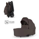 Silver Cross Nia Compact Travel Stroller & Bassinet Bundle in chocolate color; features a folded stroller and a bassinet, labeled IATA Cabin Compliant.
