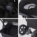 Compact travel stroller in Onyx Black showing harness details, storage basket, rear wheels, and mesh ventilation.