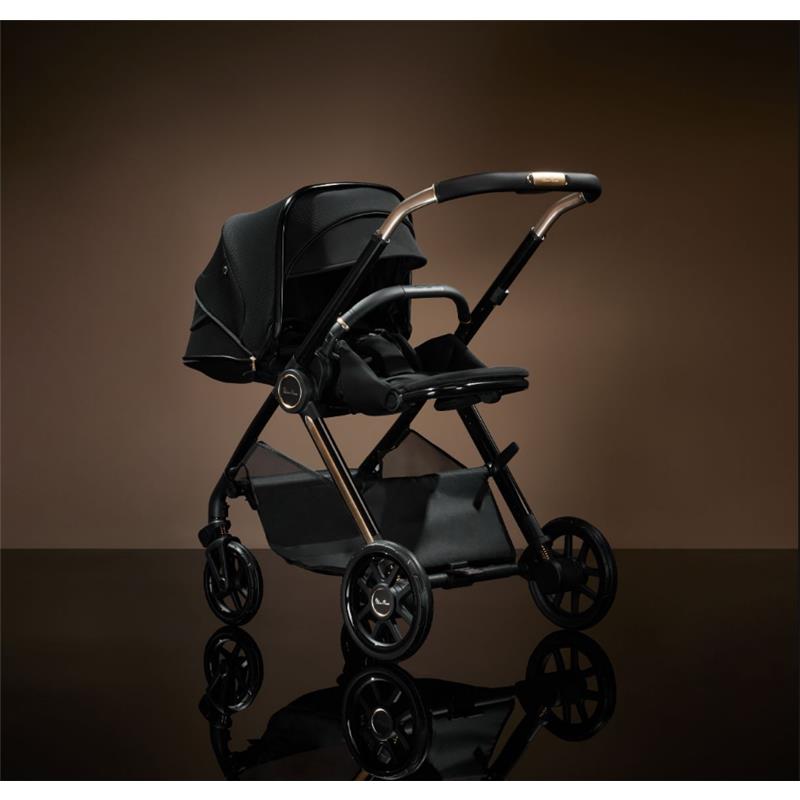 Espresso Special Edition Silver Cross Reef 2 Modular Stroller in sleek black with a stylish design and reflective wheels.