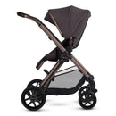 Silver Cross Reef 2 multi-terrain modular stroller in Ganache color, features a sleek design with a large canopy and spacious storage.