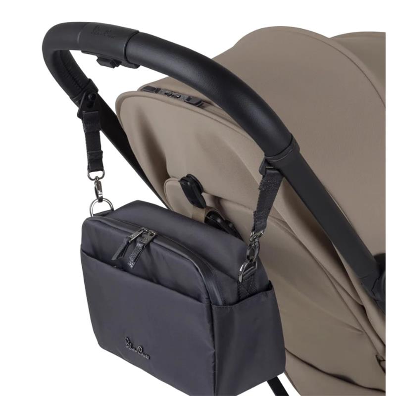 Silver Cross Universal Parent Stroller Organizer in black, attached to the handle of a stroller, featuring a zippered pocket and logo.