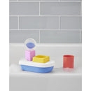 Baby bath toy set featuring a white and blue stacking boat with colorful blocks, designed for STEM learning and play.