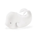 Baby bath spout cover designed as a white whale, providing safety during bath time.