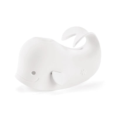 Baby bath spout cover designed as a white whale, providing safety during bath time.