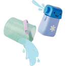 Baby bath toy set featuring a green bucket pouring blue water and a blue squirt toy with a smiling face.