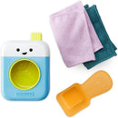 Skip Hop Baby Bath Toy Fresh & Clean Spin Cycle with a smiling face, along with two washcloths and a scoop.