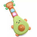 Bright green guitar toy shaped like an avocado, featuring colorful buttons, smiling face, and light-up details for infants.