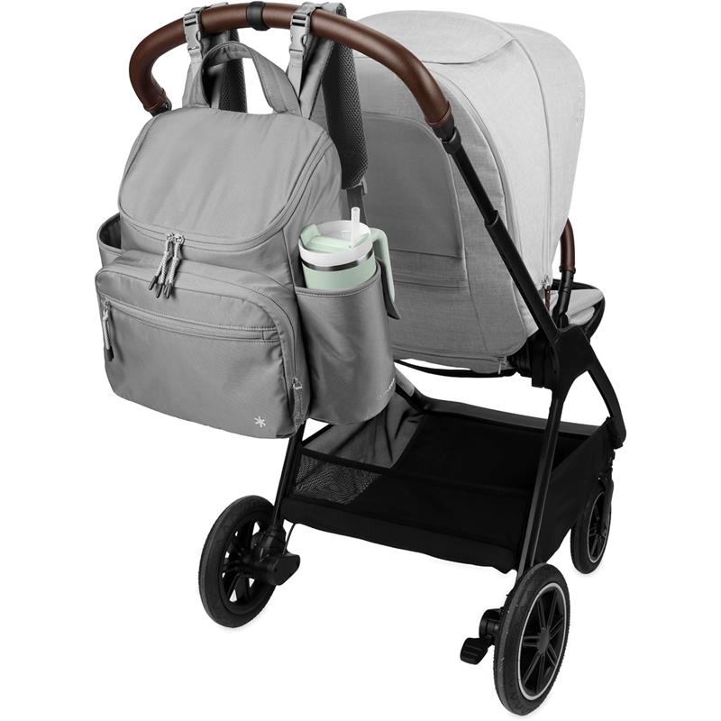 Skip Hop Diaper Bag Backpack in Forma Next Grey attached to a stroller, featuring multiple pockets and a side cup holder.