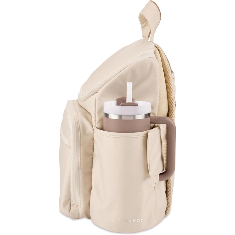 Light beige Skip Hop Diaper Bag Backpack featuring a side pocket with a brown cup and a portable changing pad.