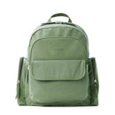 Diaper bag backpack in sage green with multiple zippered pockets and front flap, includes a portable changing pad.