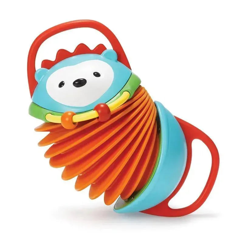 Colorful hedgehog-shaped accordion toy with a smiling face and multiple flexible sections for toddlers.
