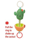 Cactus-shaped hanging toy with a plush texture and pull ring to activate shaking, designed for infant stimulation.