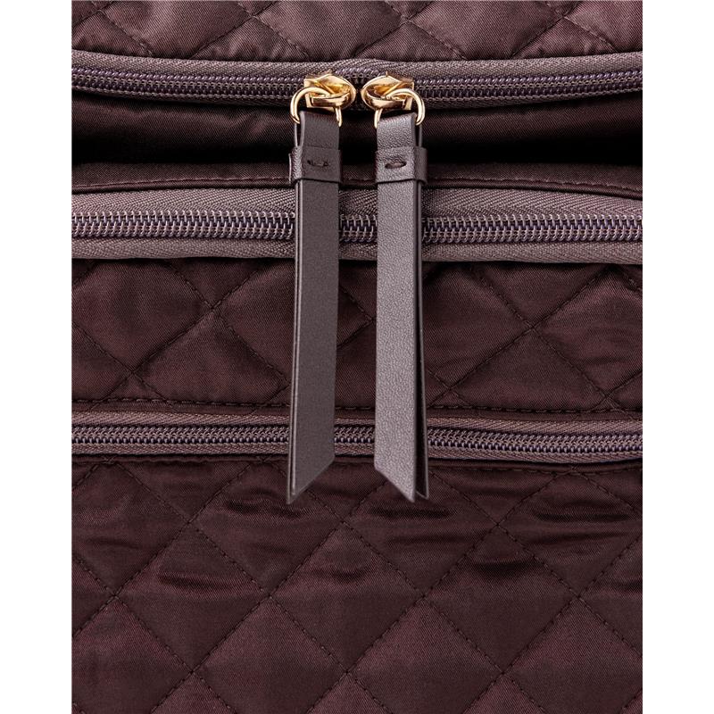 Chocolate-colored Skip Hop Forma Backpack featuring quilted fabric and double zippered compartments.