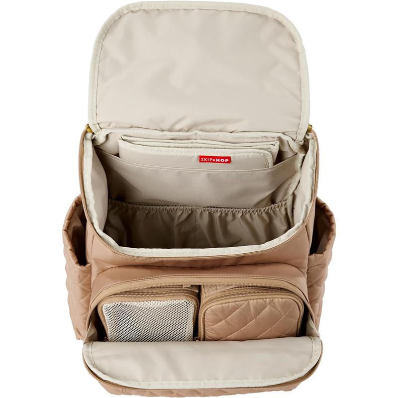 Skip Hop Forma Diaper Backpack in camel color, featuring a spacious interior with multiple pockets and a quilted texture.