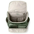 Diaper backpack in sage color featuring multiple compartments, a gray interior, and a front mesh pocket for easy access.