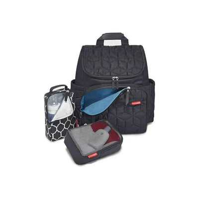 Skip Hop Forma Diaper Bag Backpack in black, featuring multiple compartments and accessories, including a bottle holder and storage pouch.