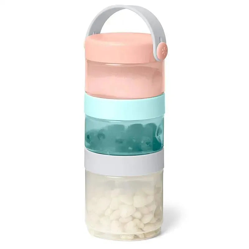 Stackable container set in teal, grey, and pastel colors, designed for transitioning from formula to food storage.