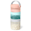 Stackable container set in teal, grey, and pastel colors, designed for transitioning from formula to food storage.