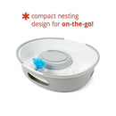 3-in-1 potty with a compact nesting design, featuring a gray base and a blue disposable liner for travel convenience.