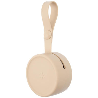 Grab & Go Silicone Pacifier Holder in oat color, featuring a round design and a loop for easy attachment.