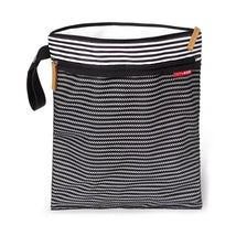 Grab & Go Wet/Dry Bag in black and white stripe with a top zipper and side handle for easy carrying.