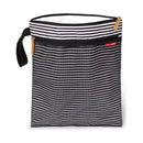 Grab & Go Wet/Dry Bag in black and white stripe with a top zipper and side handle for easy carrying.
