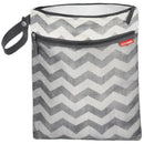 Skip Hop Grab & Go Wet/Dry Bag in white and grey chevron pattern, featuring a zippered compartment and carry strap.