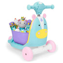 3-in-1 ride-on toy in the shape of a unicorn, with a storage bucket filled with plush toys and colorful accessories.