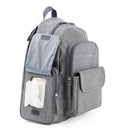 Heather grey Skip Hop Luna diaper bag backpack featuring a front pocket with a portable changing pad and wipes container.