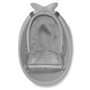 Moby Smart Sling 3-Stage Tub in grey features a textured mesh seat, designed for baby bathing safety and comfort.