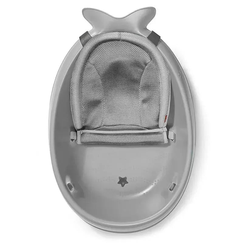 Grey Moby Smart Sling 3-Stage Tub with a padded mesh seat and safety straps, designed for baby bathing.