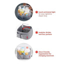 Nursery Style Light Up Diaper Caddy in oat color with touch-activated light, modular divider, and four storage pockets.