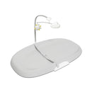 Grey wipe-clean changing pad with safety strap and mobile featuring a sun and cloud. Ideal for nursery use.