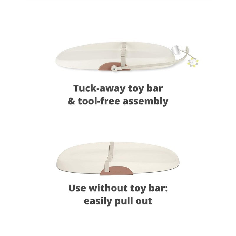 Wipe-clean changing pad featuring a tuck-away toy bar and descriptions of tool-free assembly and alternative use.
