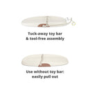 Wipe-clean changing pad featuring a tuck-away toy bar and descriptions of tool-free assembly and alternative use.