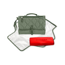Portable baby changing pad in sage green with a zippered pocket, accompanied by a red wipe case.