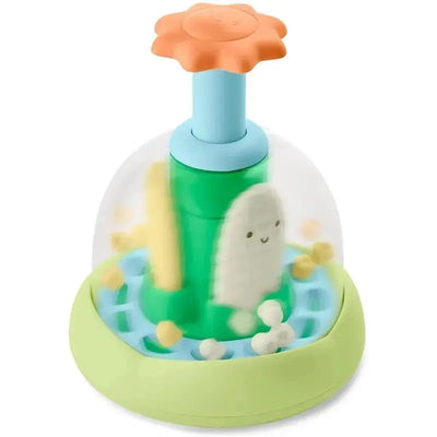 Colorful push and spin baby learning toy by Skip Hop featuring a smiling flower top and playful farm-themed elements.