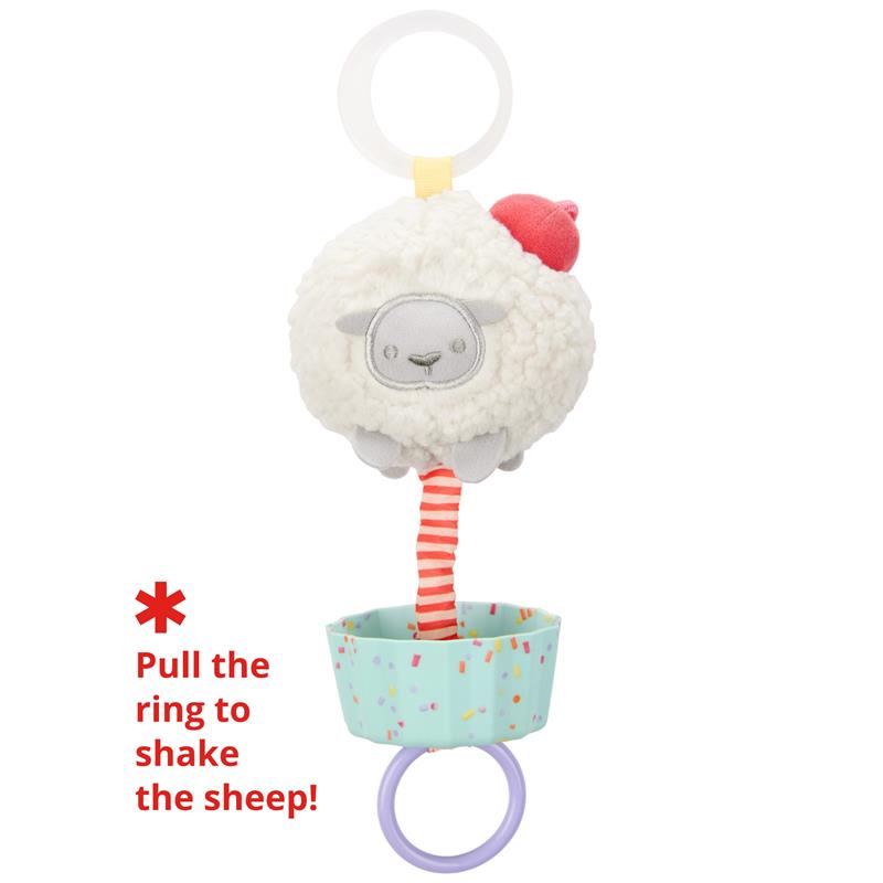 Sheep Cupcake Jitter Stroller Toy by Skip Hop, featuring a plush sheep with a colorful cupcake base and a pull ring to activate movement.