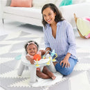 Skip Hop Silver Lining Cloud 2-in-1 Activity Floor Seat with a smiling baby and parent on a soft mat, featuring colorful toys attached.