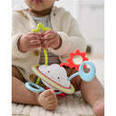 Baby playing with the Skip Hop Silver Lining Cloud Pull & Play toy, featuring colorful rings and smiling cloud design.