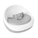 Grey and white Skip Hop Sleek Seat Booster with a padded seat and adjustable safety strap.