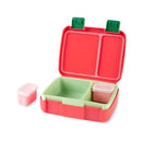 Bento lunch box by Skip Hop featuring a red exterior, green compartments, and two small containers for snacks.