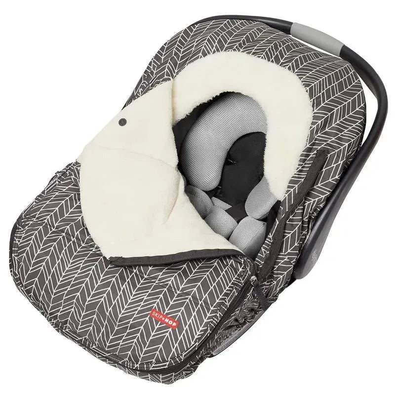 Grey feather-patterned Skip Hop Stroll & Go Car Seat Cover with soft shearling lining and adjustable straps.