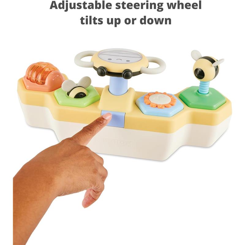 Colorful Skip Hop developmental toy features an adjustable steering wheel and interactive elements for cause-and-effect learning.