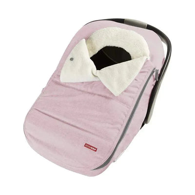 Winter car seat cover in pink heather with soft white lining, designed for warmth and protection.