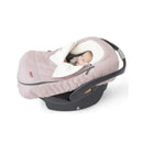 Winter car seat cover in pink heather with a baby peeking out, featuring a soft fleece lining and zippered closure.