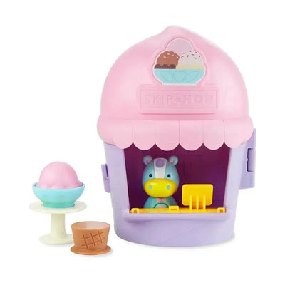 Skip Hop Zoo Ice Cream Shoppe Playset featuring a unicorn character, ice cream scoop, and serving dishes.