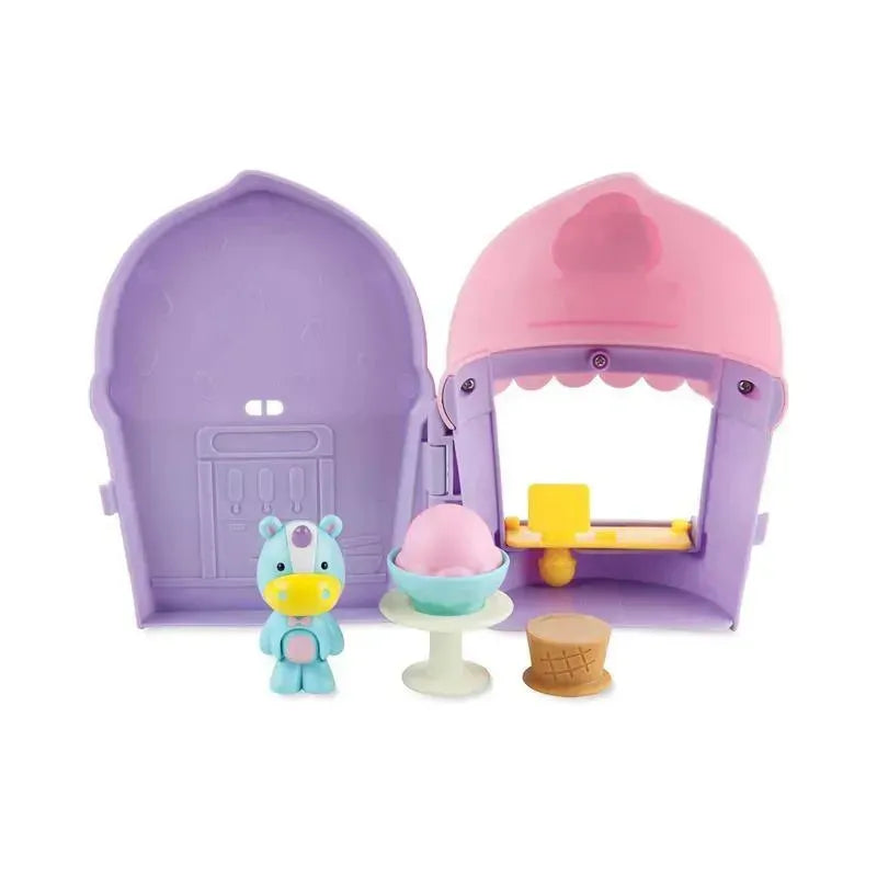Skip Hop Zoo Ice Cream Shoppe Playset featuring a unicorn character, ice cream cone, and a pastel-colored ice cream display.