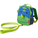 Dino-themed Skip Hop Zoo Mini Backpack in blue and green, featuring eyes, a snout, and a detachable strap.